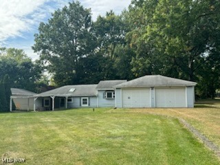 3054 Long Road Akron, OH 44312 - Photo 2 of 18 View of front of property featuring a yard