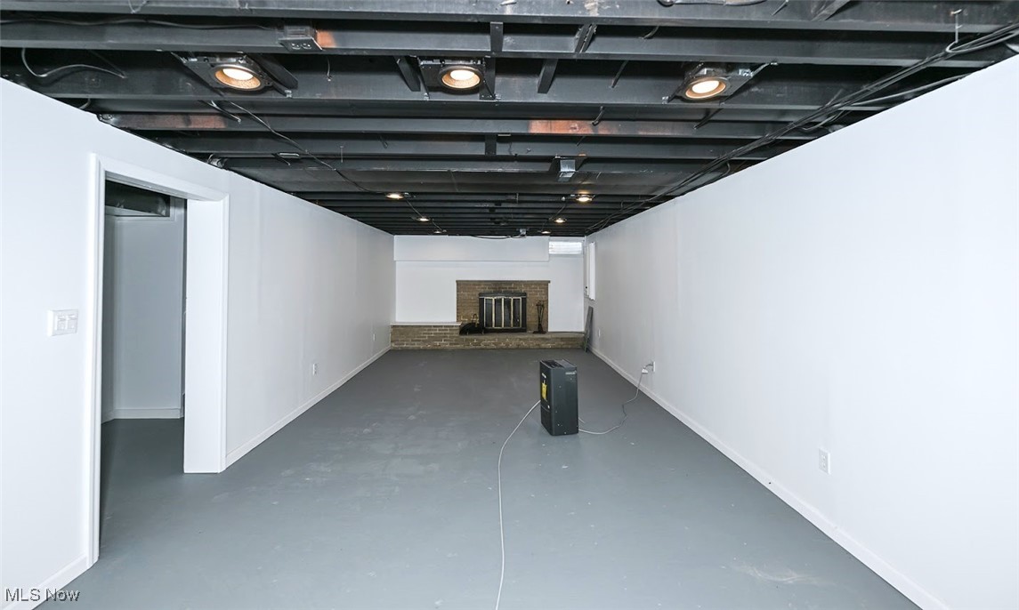 351 North Messner Road Akron, OH 44319 - Photo 32 of 44 *FINISHED BASEMENT W/DRYWALL, BLACK MODERN CEILING, RECESSED LIGHTING, 2ND FIREPLACE FOR A GREAT LARGE RECREATION ROOM ~
