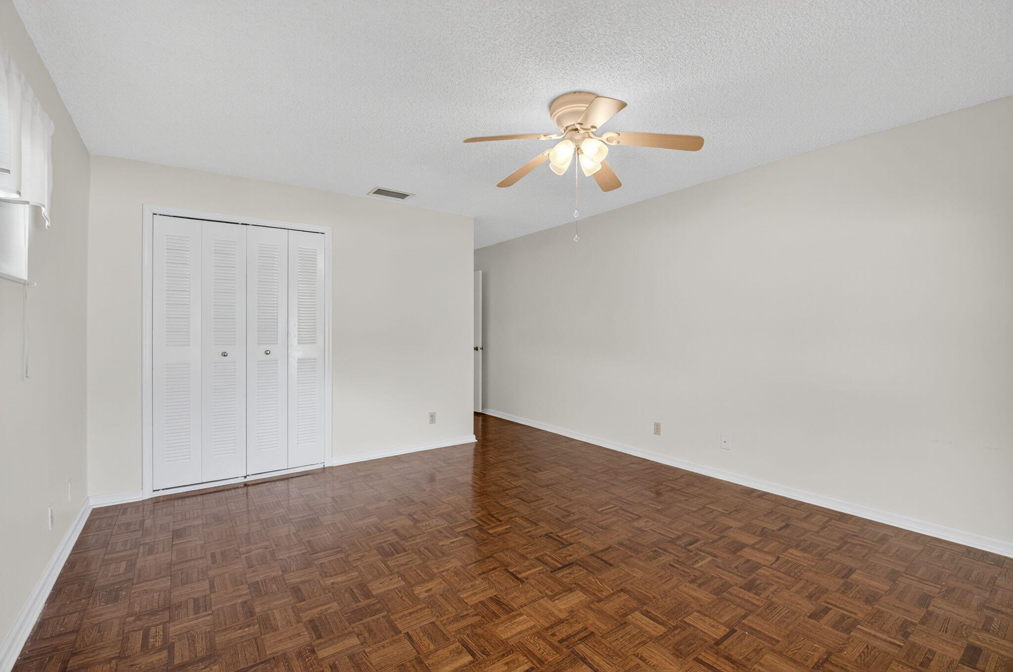 9855 Loquat Tree Run, Unit A Boynton Beach, FL 33436 - Photo 22 of 52 Primary Bedroom