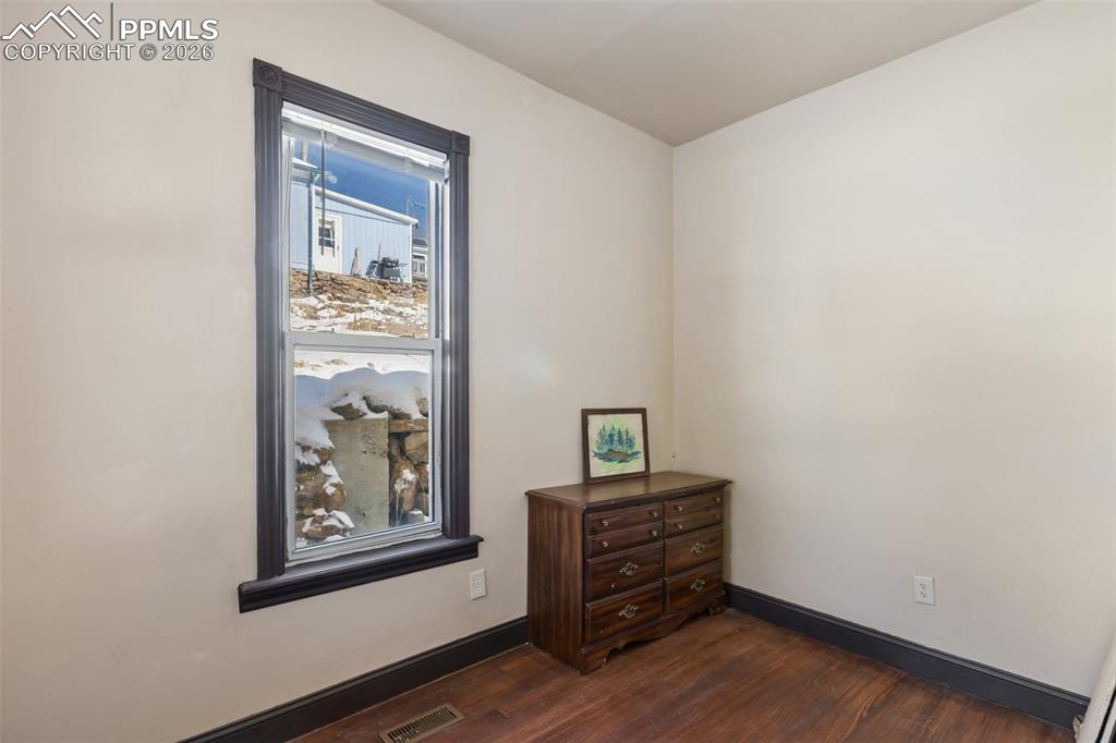 112 6th Street Victor, CO 80860 - Photo 16 of 35 a room with a bed and a window