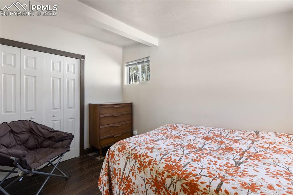 112 6th Street Victor, CO 80860 - Photo 20 of 35 a bedroom with a bed and cabinets