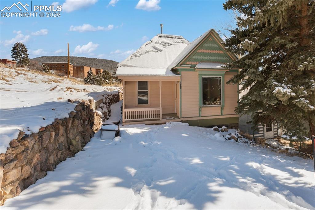 112 6th Street Victor, CO 80860 - Photo 35 of 35 a view of a house with a snow in the yard