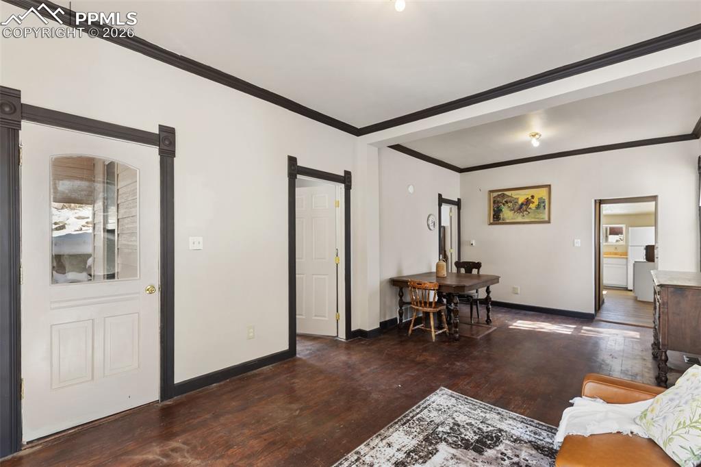 112 6th Street Victor, CO 80860 - Photo 8 of 35 a living room with furniture and wooden floor