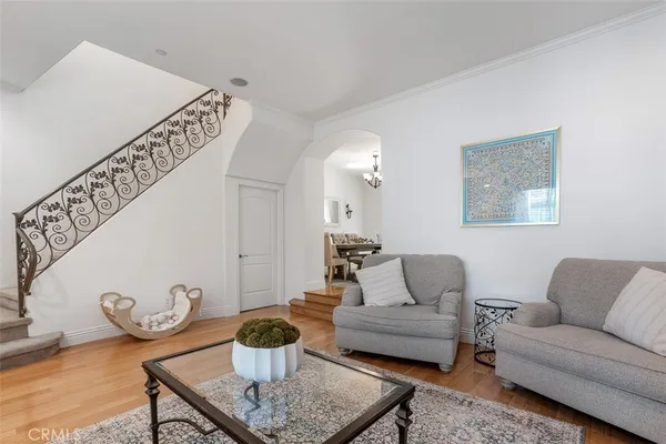 a living room with furniture and a table