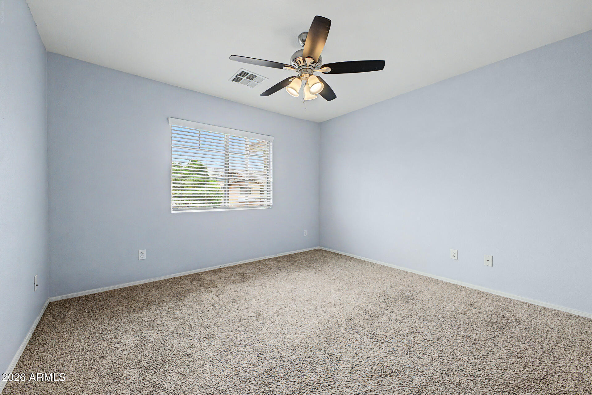 1379 East Joseph Way Gilbert, AZ 85295 - Photo 21 of 44 a view of an empty room with a window