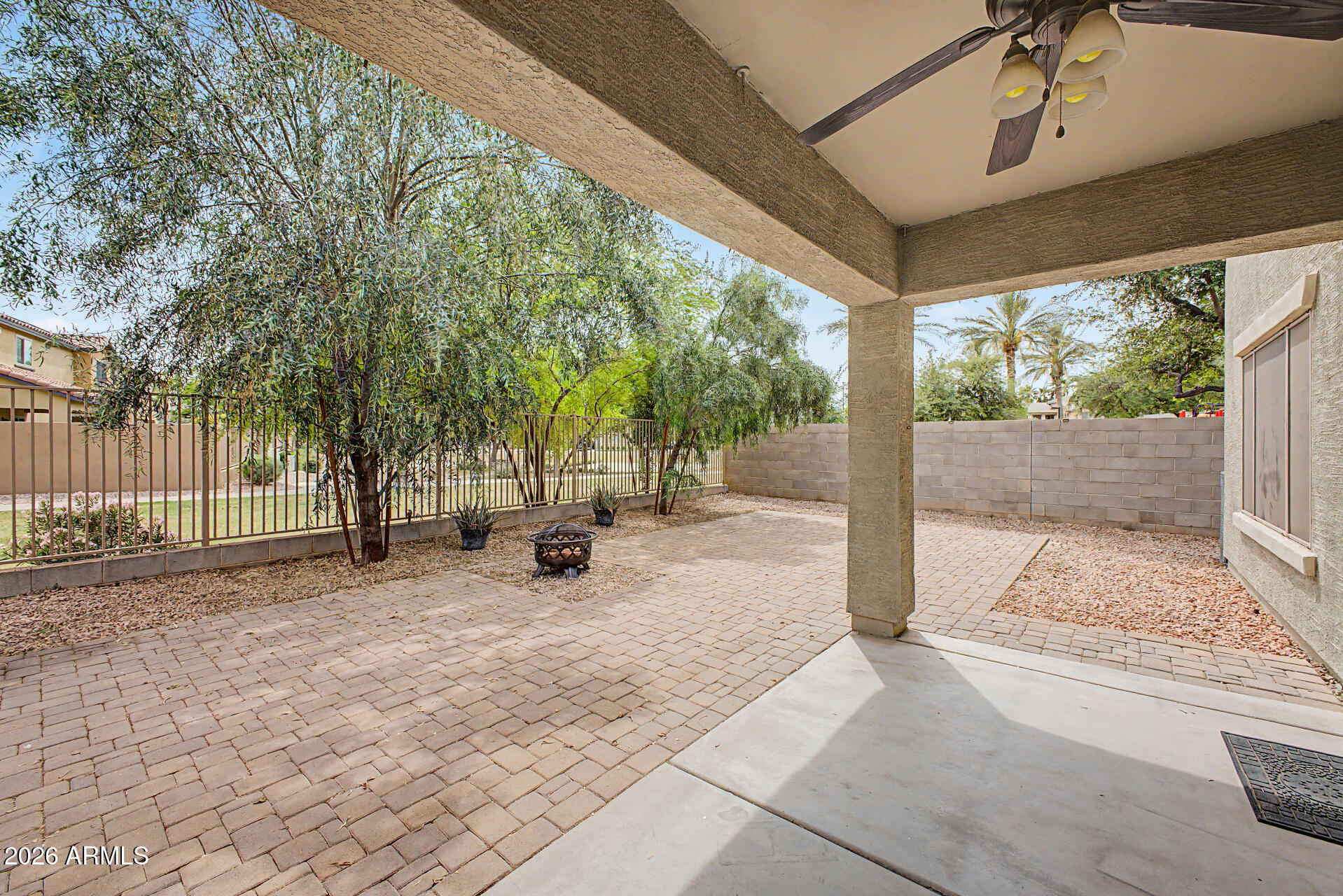 1379 East Joseph Way Gilbert, AZ 85295 - Photo 27 of 44 a view of a backyard with a large tree