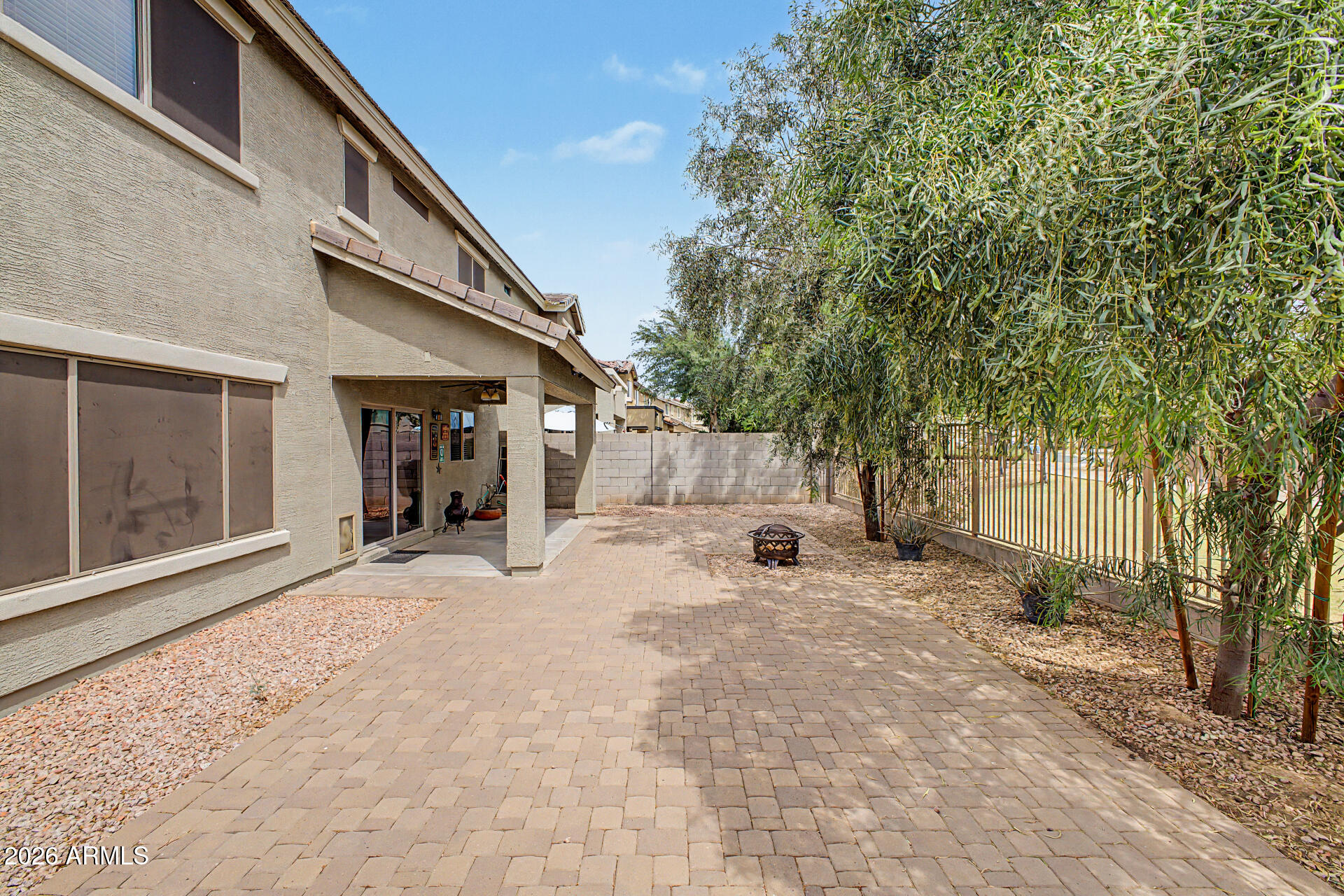 1379 East Joseph Way Gilbert, AZ 85295 - Photo 29 of 44 a view of a house with a backyard and a tree