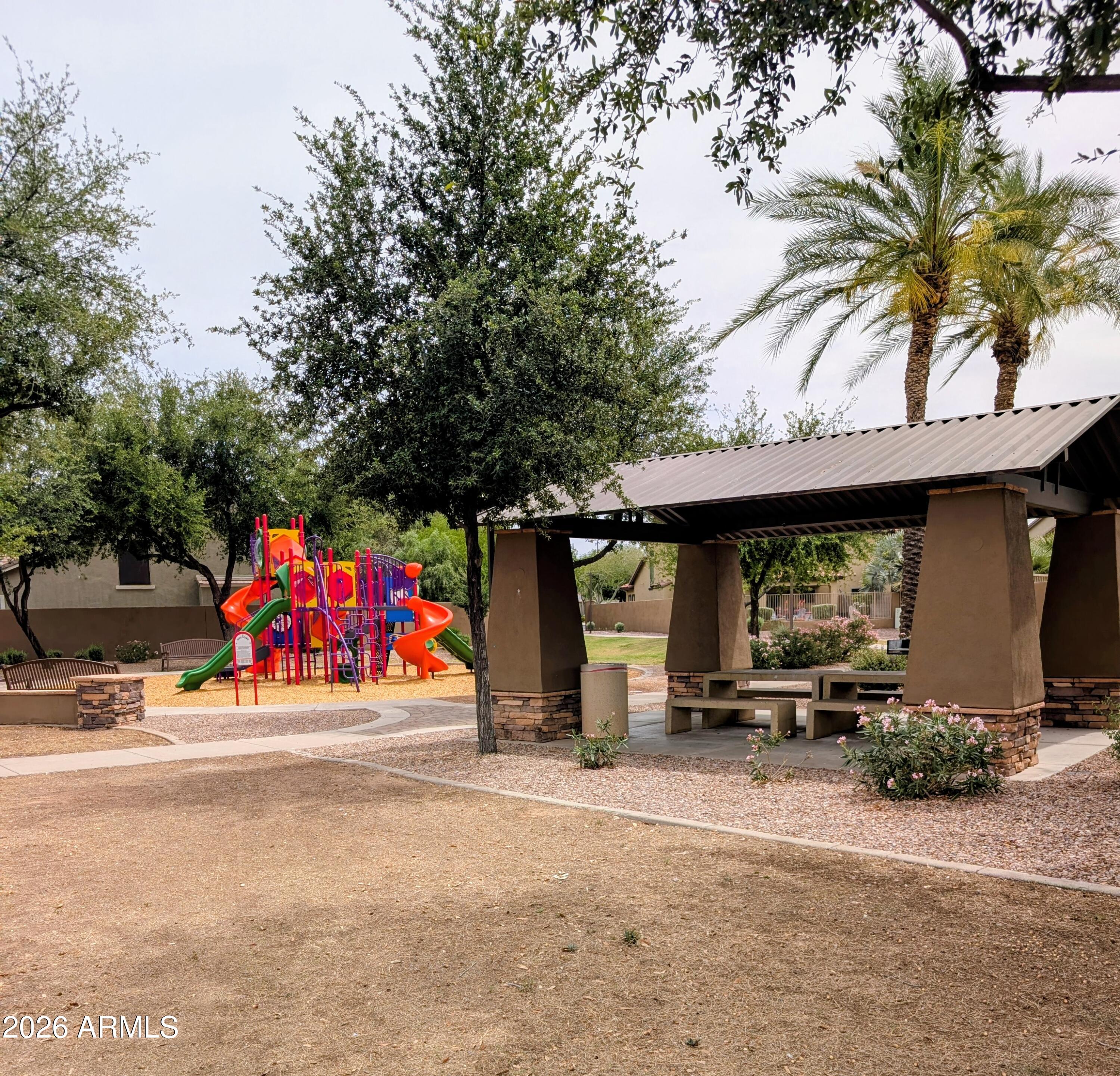 1379 East Joseph Way Gilbert, AZ 85295 - Photo 35 of 44 an outdoor space with lots of swings and slides