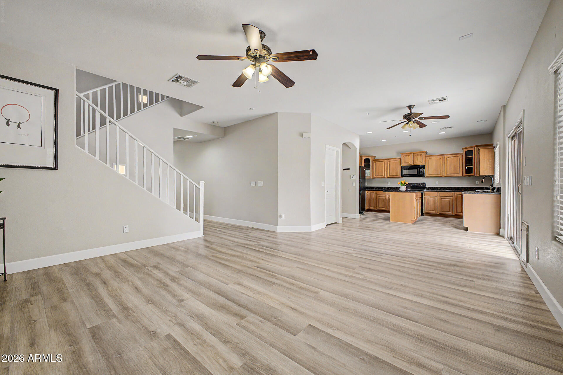 1379 East Joseph Way Gilbert, AZ 85295 - Photo 4 of 44 wooden floor in an empty room with a window
