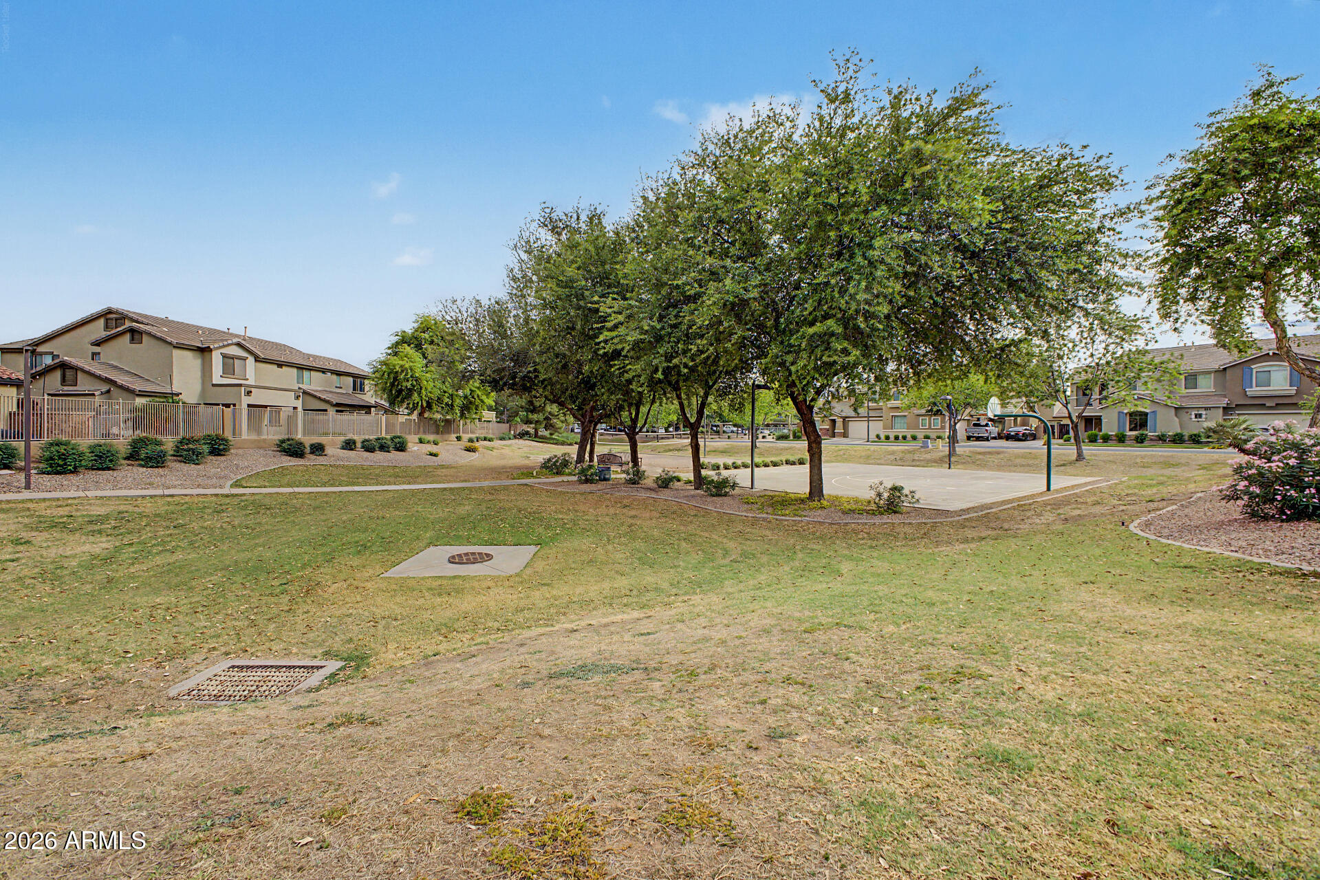 1379 East Joseph Way Gilbert, AZ 85295 - Photo 41 of 44 a view of yard with swimming pool and trees