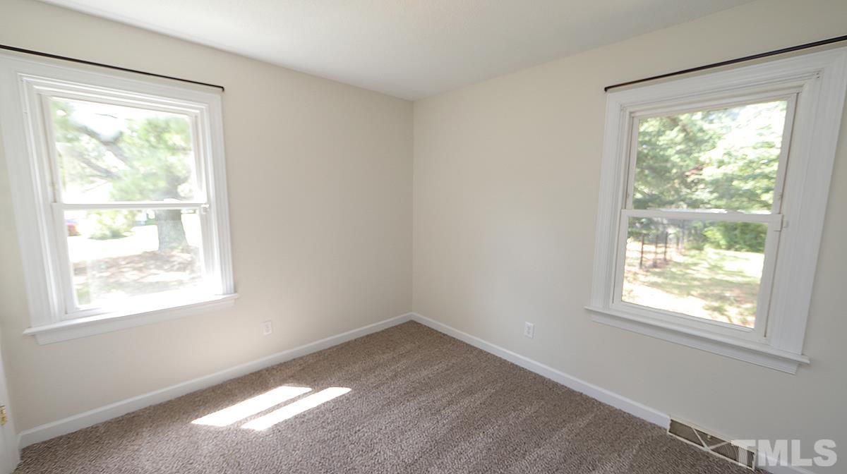 4101 Edgemont Road Wendell, NC 27591 - Photo 10 of 12 an empty room with a window