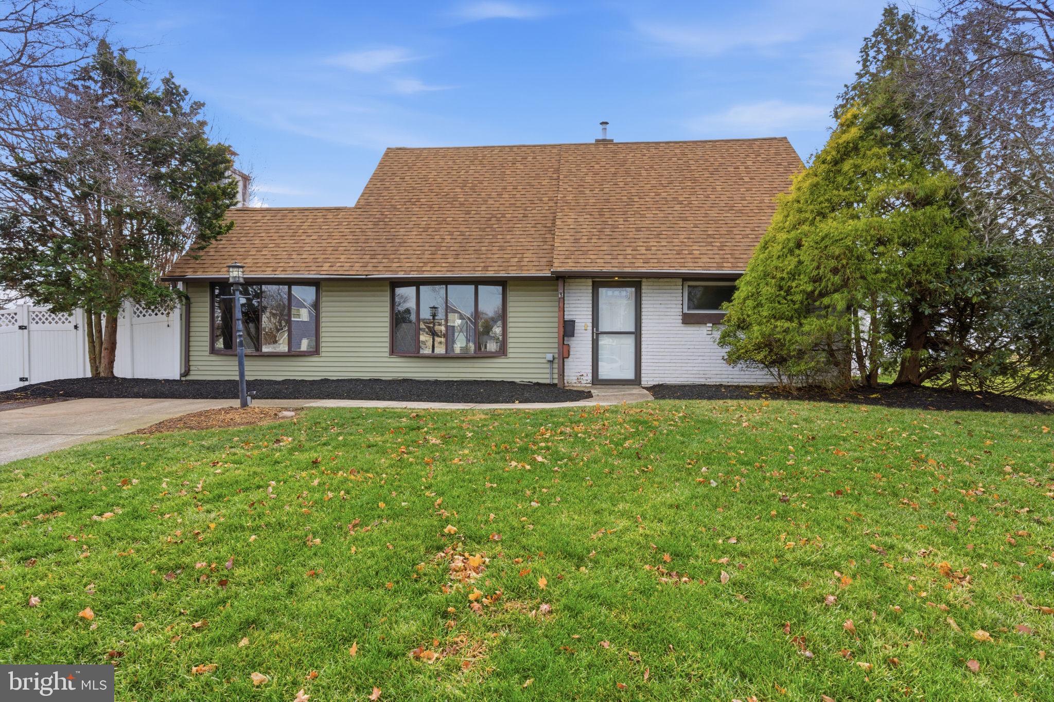 28 Cloister Road Levittown, PA 19057 - Photo 1 of 28 a front view of a house with garden