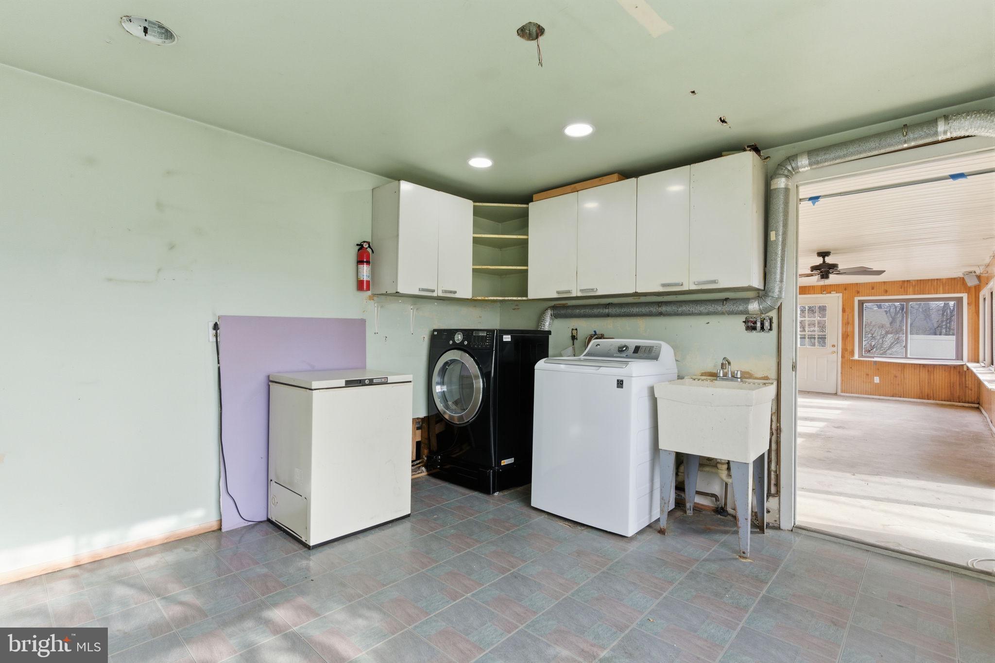 28 Cloister Road Levittown, PA 19057 - Photo 16 of 28 a view of kitchen with stainless steel appliances cabinets and furniture