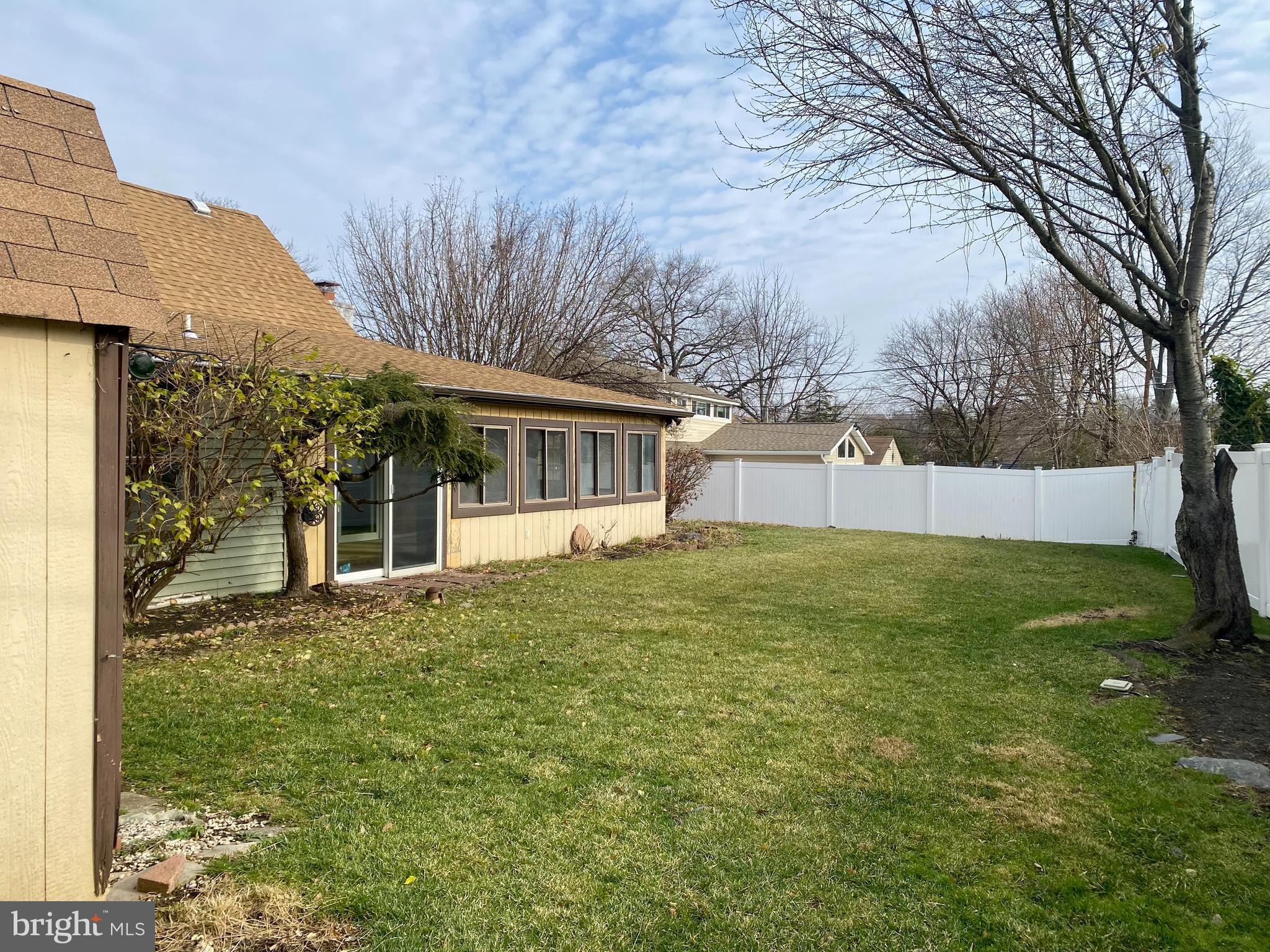 28 Cloister Road Levittown, PA 19057 - Photo 27 of 28 a view of a house with a backyard