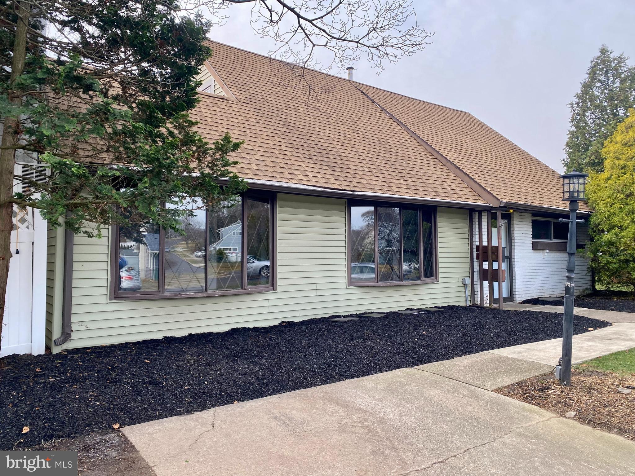 28 Cloister Road Levittown, PA 19057 - Photo 3 of 28 a front view of a house with garden