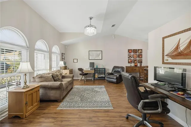 a living room with furniture or couch and a flat screen tv