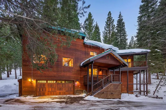a front view of a house with yard