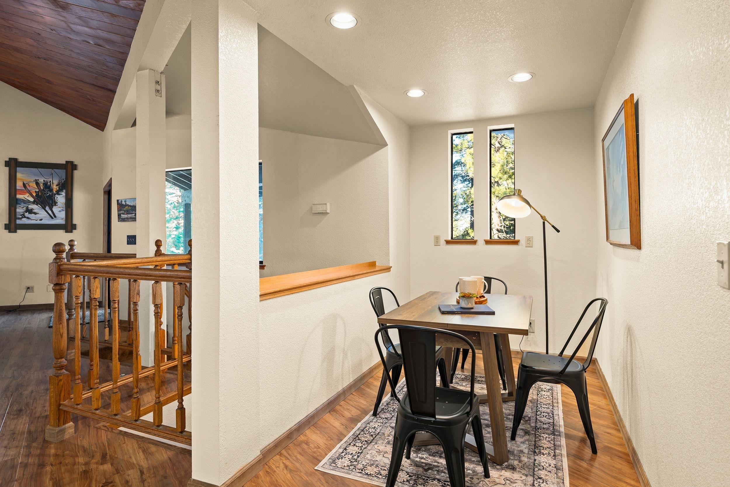 711 Conifer Truckee, CA 96161 - Photo 13 of 26 a view of a dining room with furniture and a potted plant