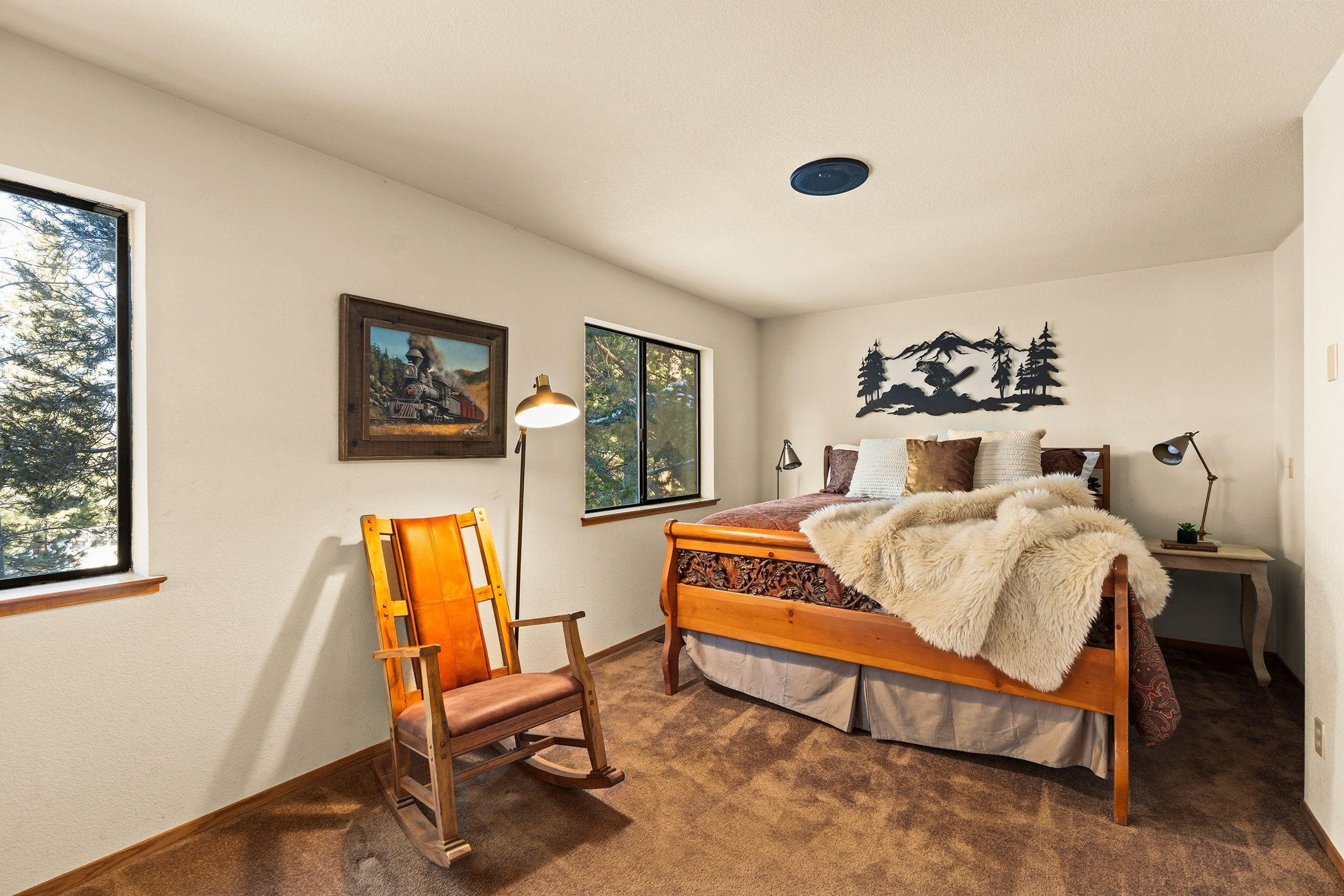 711 Conifer Truckee, CA 96161 - Photo 17 of 26 a bedroom with a bed chair and a window