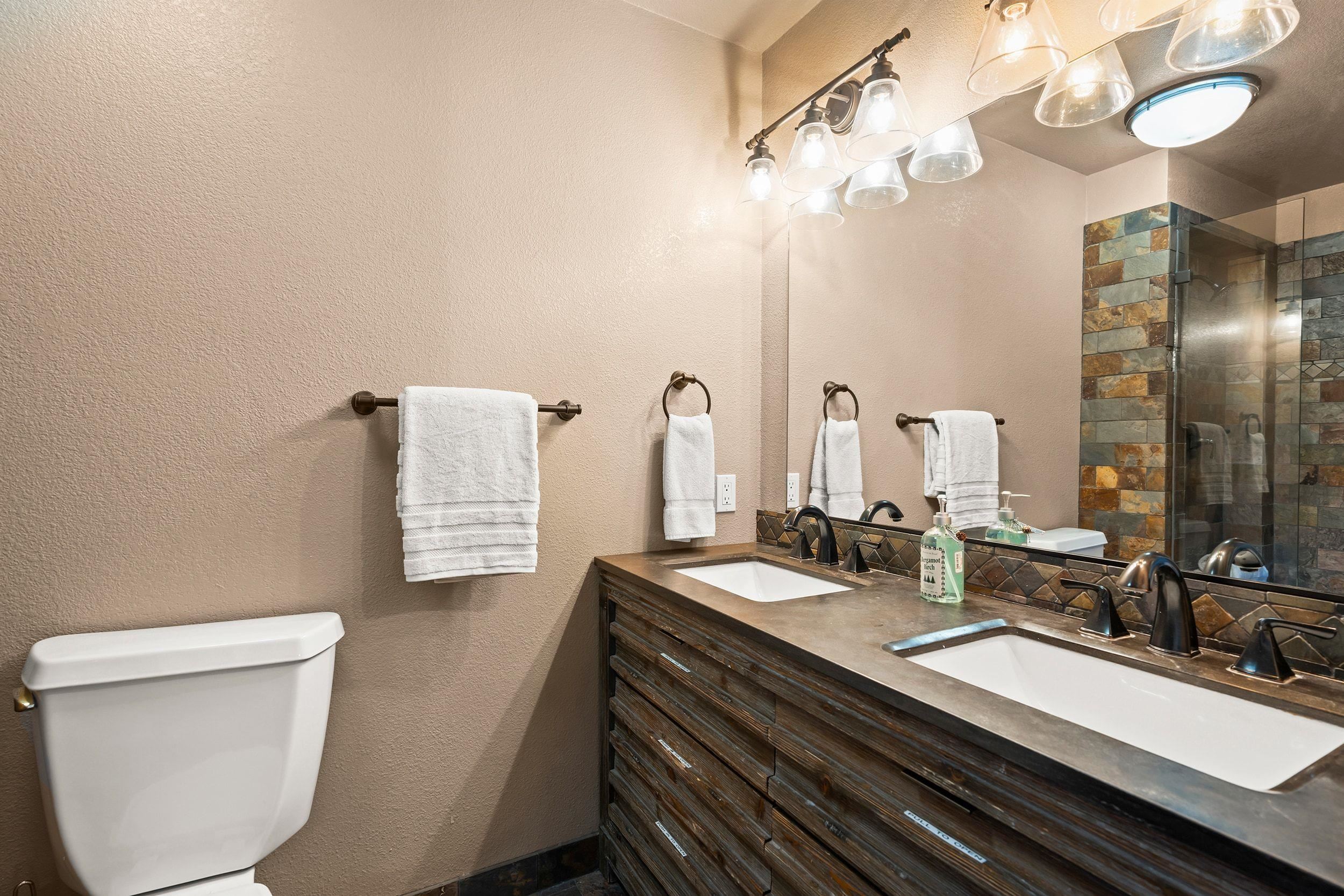 711 Conifer Truckee, CA 96161 - Photo 19 of 26 a bathroom with a sink and a mirror