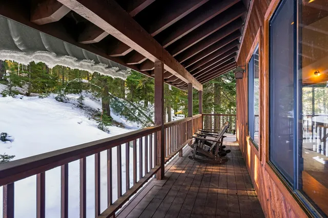 a view of balcony with furniture