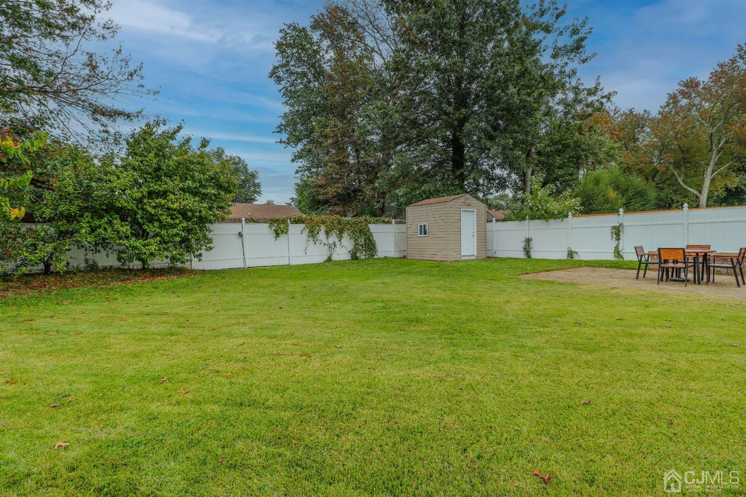 21 Kenmore Road Edison, NJ 08817 - Photo 22 of 23 a view of a house with a yard