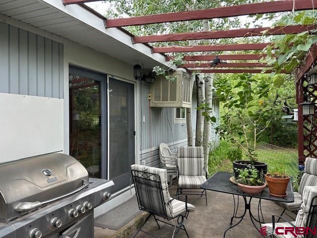 39389 Pitkin Road Paonia, CO 81428 - Photo 4 of 42 Enjoy your evening cookouts under the trees just ouside the dining room