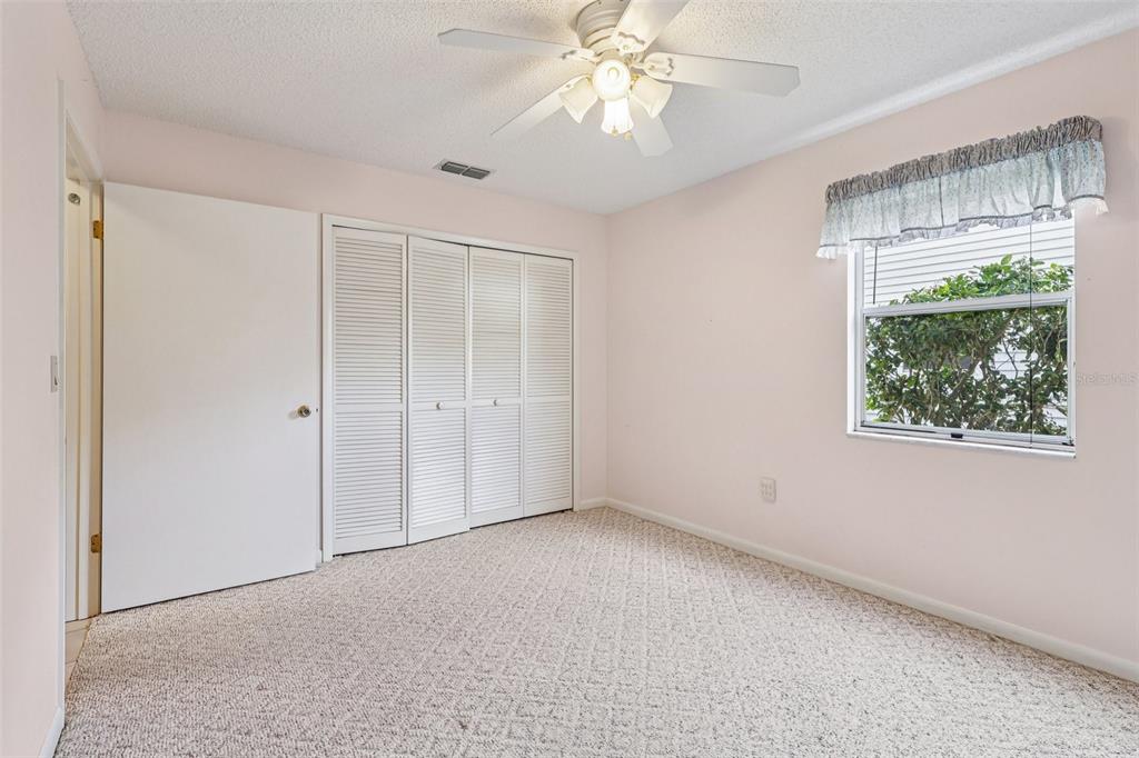 305 Brigadoon Circle Leesburg, FL 34788 - Photo 21 of 38 a view of an empty room with a window