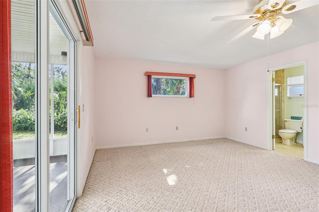 305 Brigadoon Circle Leesburg, FL 34788 - Photo 26 of 38 an empty room with windows