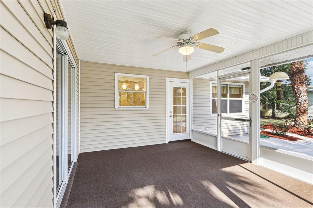 305 Brigadoon Circle Leesburg, FL 34788 - Photo 33 of 38 a view of a livingroom with a ceiling fan and window