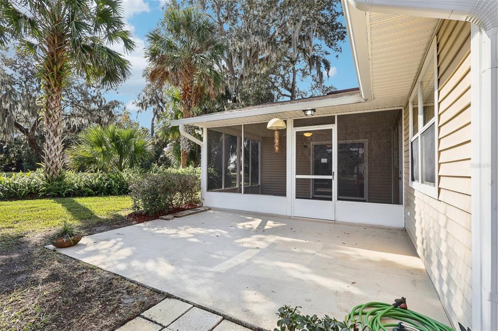 305 Brigadoon Circle Leesburg, FL 34788 - Photo 34 of 38 a view of a brick house with a large windows