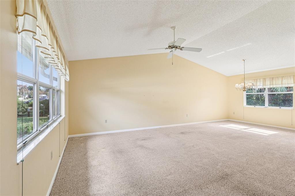 305 Brigadoon Circle Leesburg, FL 34788 - Photo 10 of 38 a view of an empty room with a window