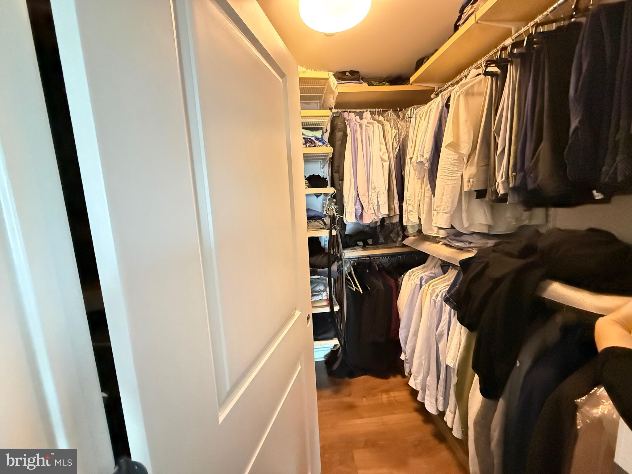 901 North Penn Street, Unit R2101 Philadelphia, PA 19123 - Photo 27 of 33 a view of walk in closet with clothes and shoes