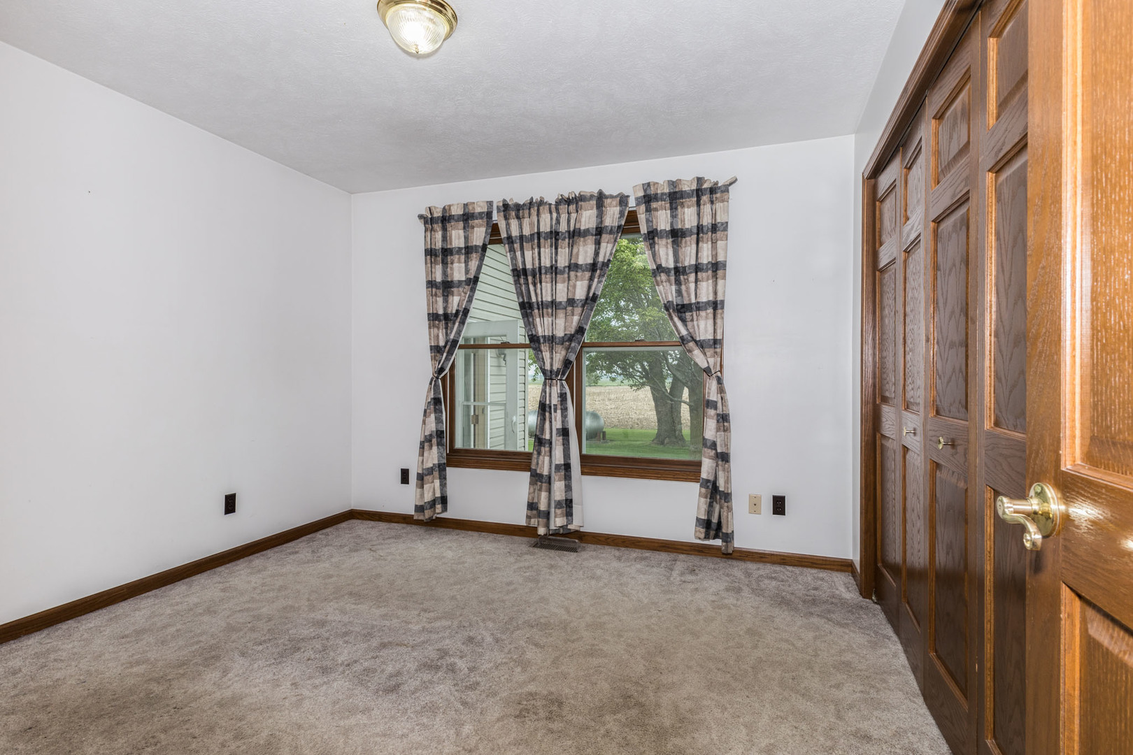9375 East 3000 N Road Cornell, IL 61319 - Photo 21 of 39 a view of an empty room with a window
