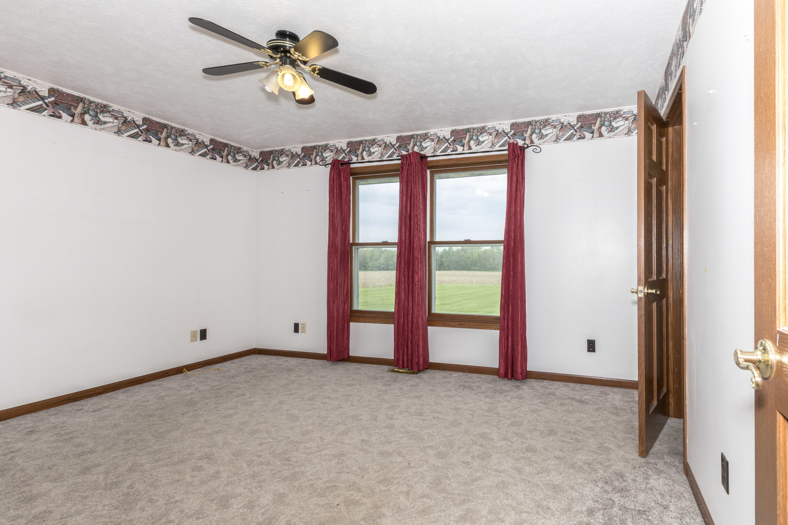 9375 East 3000 N Road Cornell, IL 61319 - Photo 23 of 39 a view of an empty room with a window