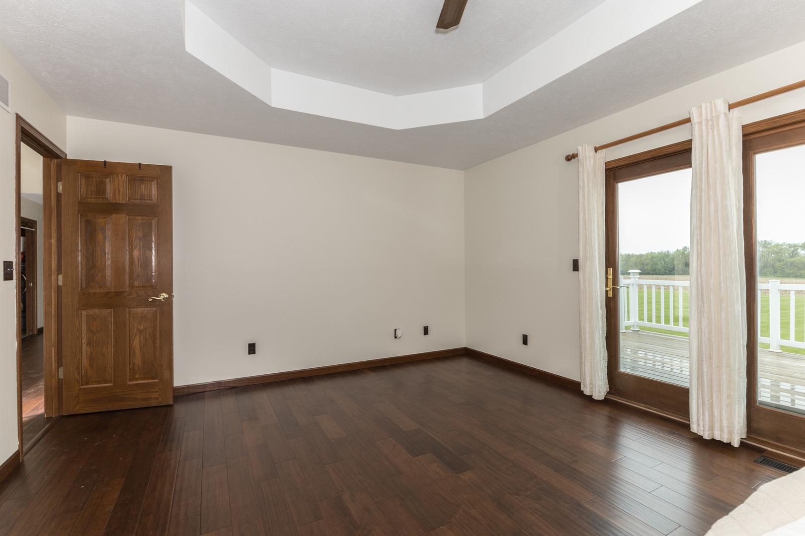 9375 East 3000 N Road Cornell, IL 61319 - Photo 8 of 39 an empty room with wooden floor and windows