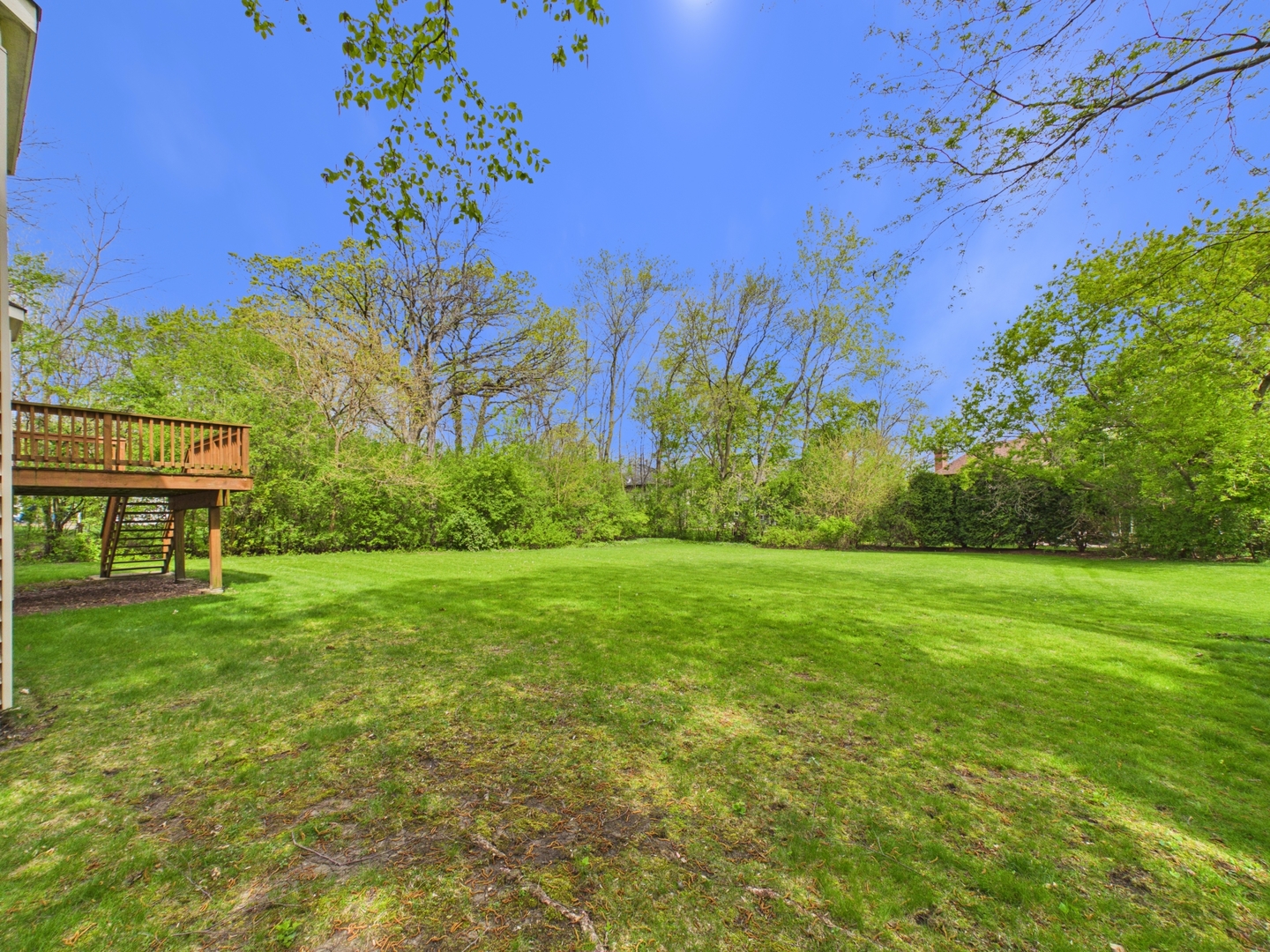 7486 Abbey Road Gurnee, IL 60031 - Photo 33 of 35 a view of a garden with a building in the background