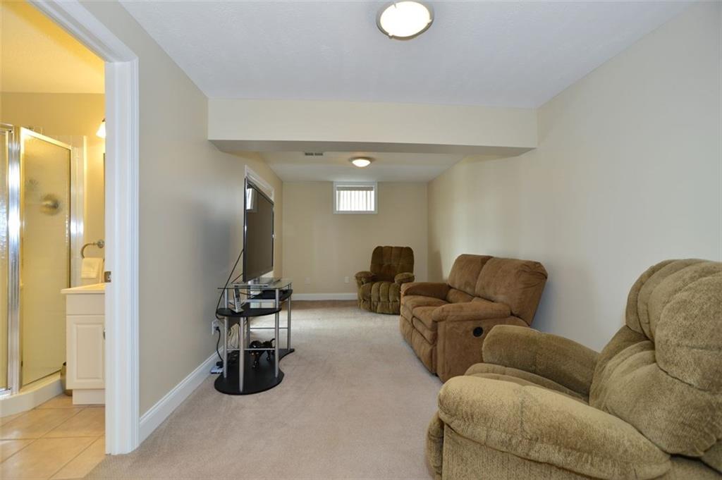 173 Warren Road Warrendale, PA 15086 - Photo 20 of 25 Lower Level features Bedroom 4 (or Family Room if preferred) with FULL BATH w/ceramic floor & shower, double closet, and Walk Out to the patio.