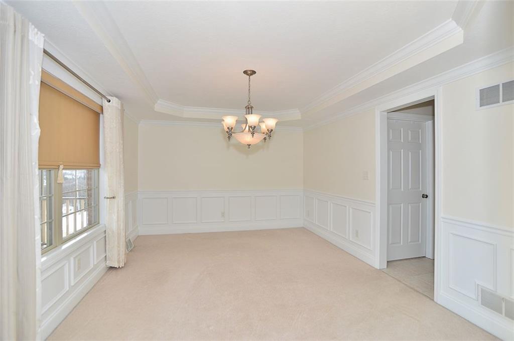 173 Warren Road Warrendale, PA 15086 - Photo 3 of 25 The Dining room features large cheery front-facing windows, tray ceiling w/ updated lighting, judges paneling and updated paint.