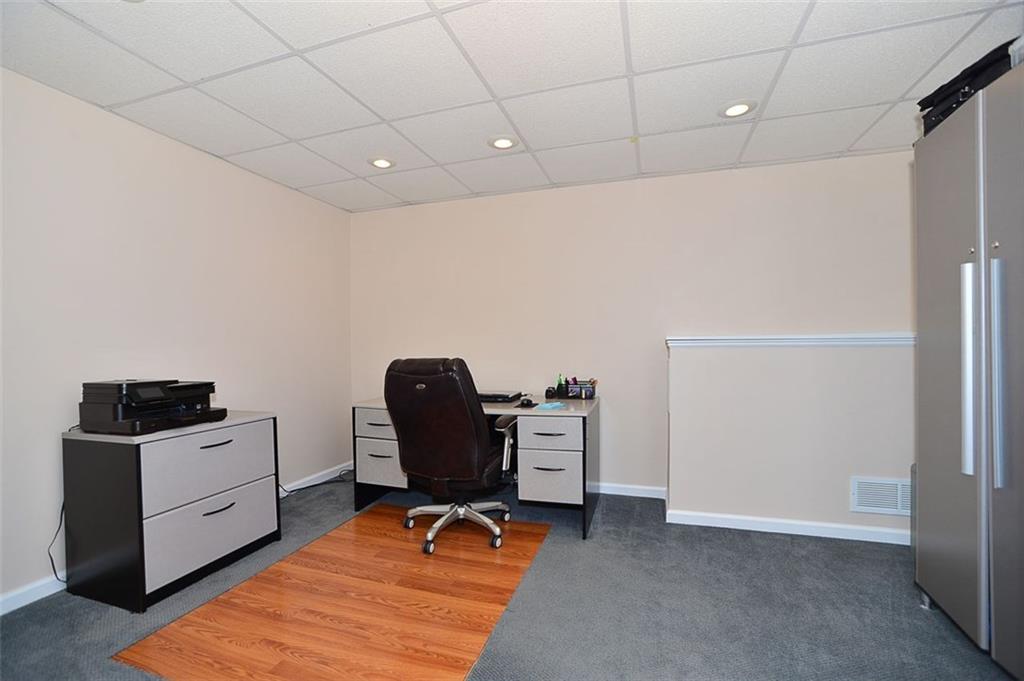 173 Warren Road Warrendale, PA 15086 - Photo 22 of 25 This spacious LL room makes a GREAT Home Office room with laminate & carpeted flooring or just a quiet room to 'get away' from life's busyness.