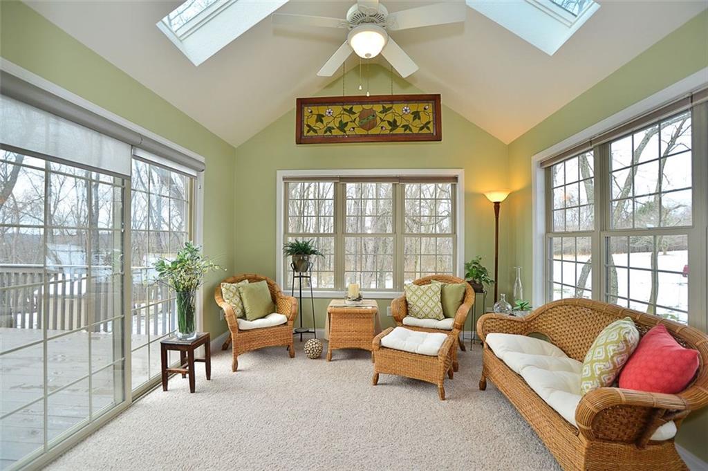 173 Warren Road Warrendale, PA 15086 - Photo 7 of 25 The 4 Seasons Room features vaulted ceiling, sky lights, three-sides of outdoor viewing and a glass slider door to the deck overlooking the lawns & woodlands.