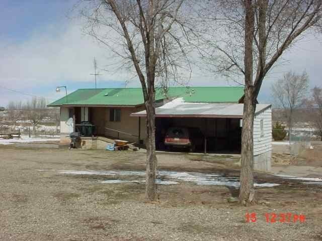 25716 Rd L Cortez, CO 81321 - Photo 4 of 4 a view of a house with backyard and tree