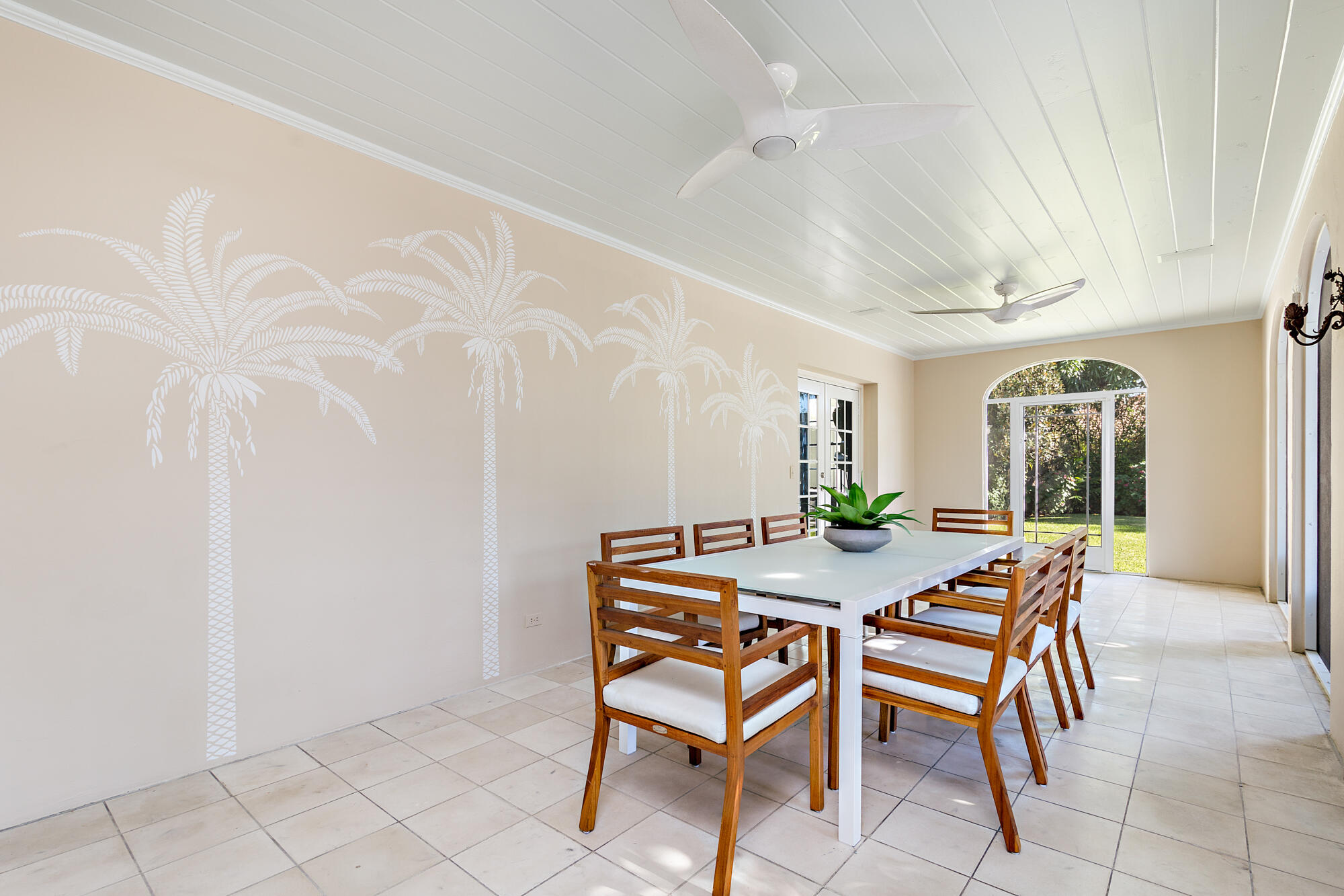 239 Emerald Lane Palm Beach, FL 33480 - Photo 10 of 29 a view of a dining room with furniture and wooden floor