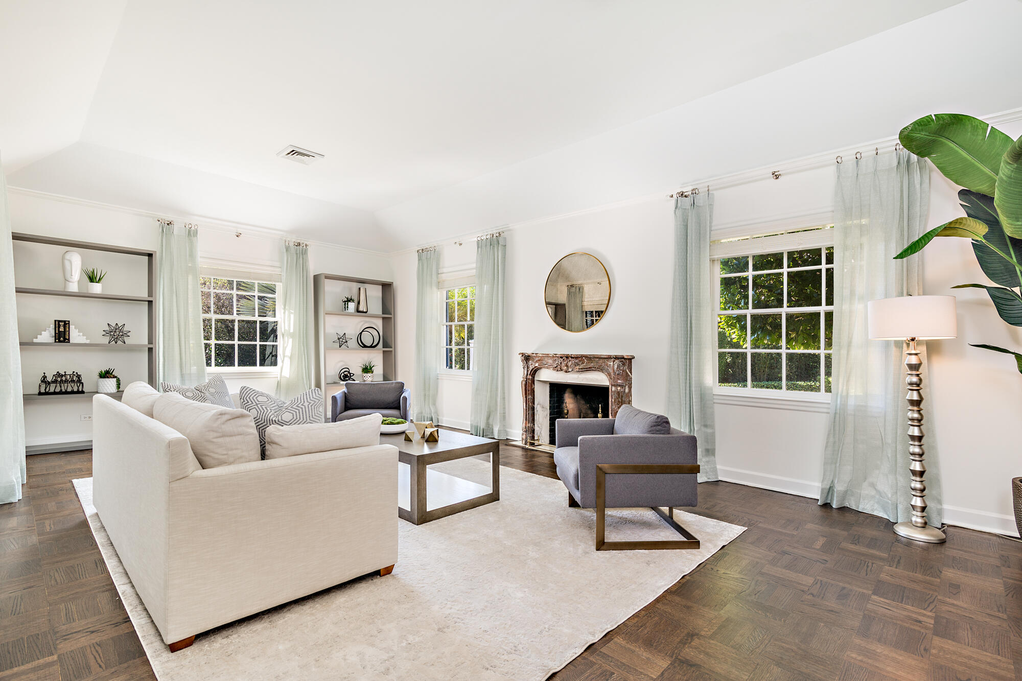 239 Emerald Lane Palm Beach, FL 33480 - Photo 21 of 29 a living room with furniture a fireplace and a large window