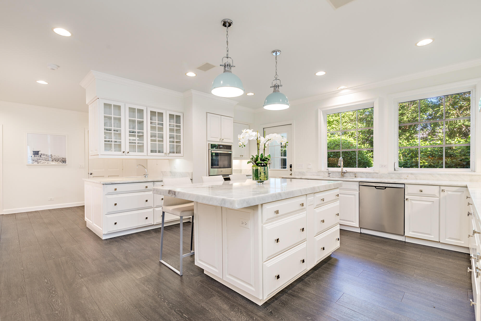 239 Emerald Lane Palm Beach, FL 33480 - Photo 24 of 29 a kitchen with a stove window and cabinets