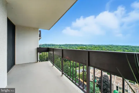 a balcony with outdoor view