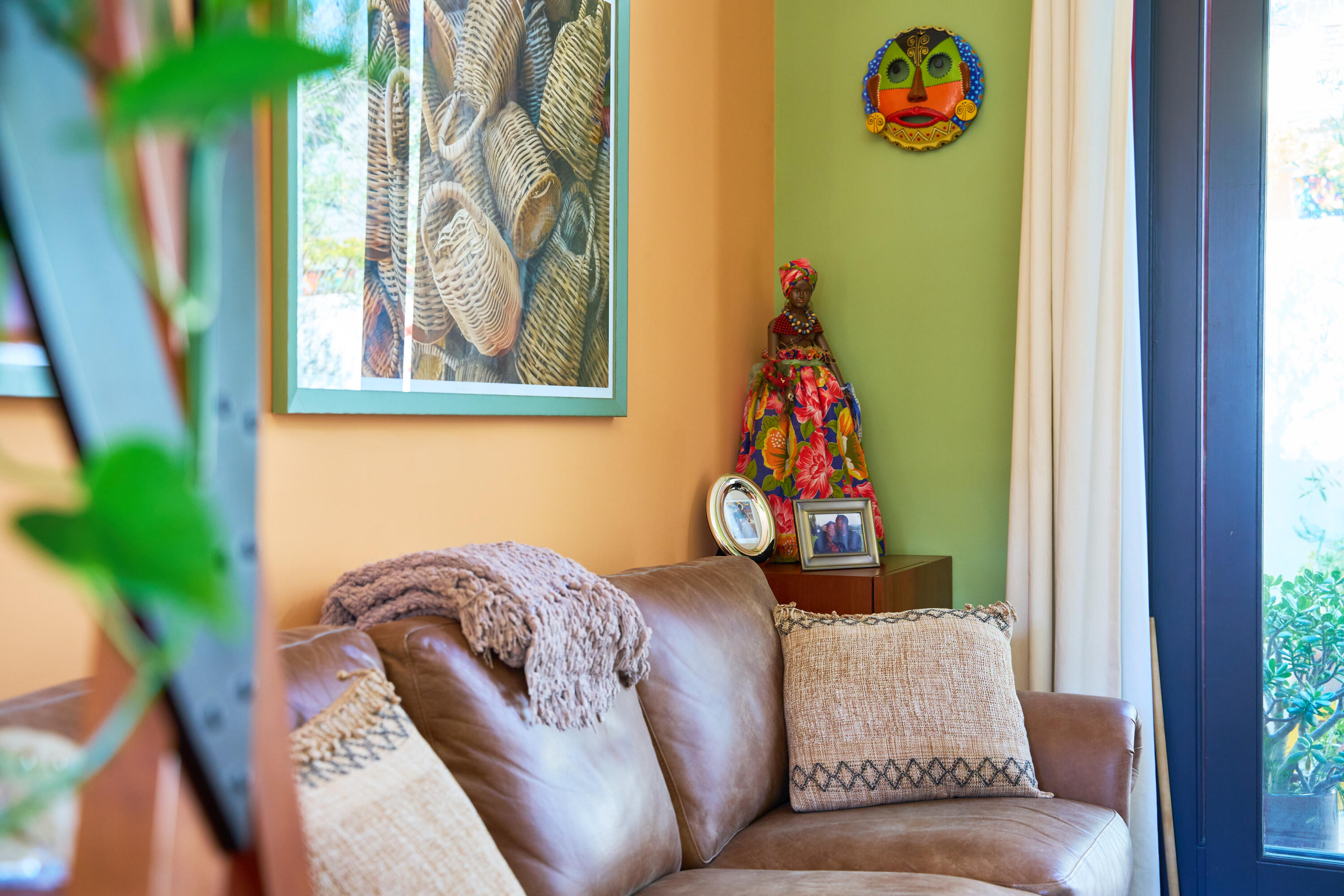 219 Equestrian Avenue Santa Barbara, CA 93101 - Photo 15 of 26 a living room with a couch and a potted plant