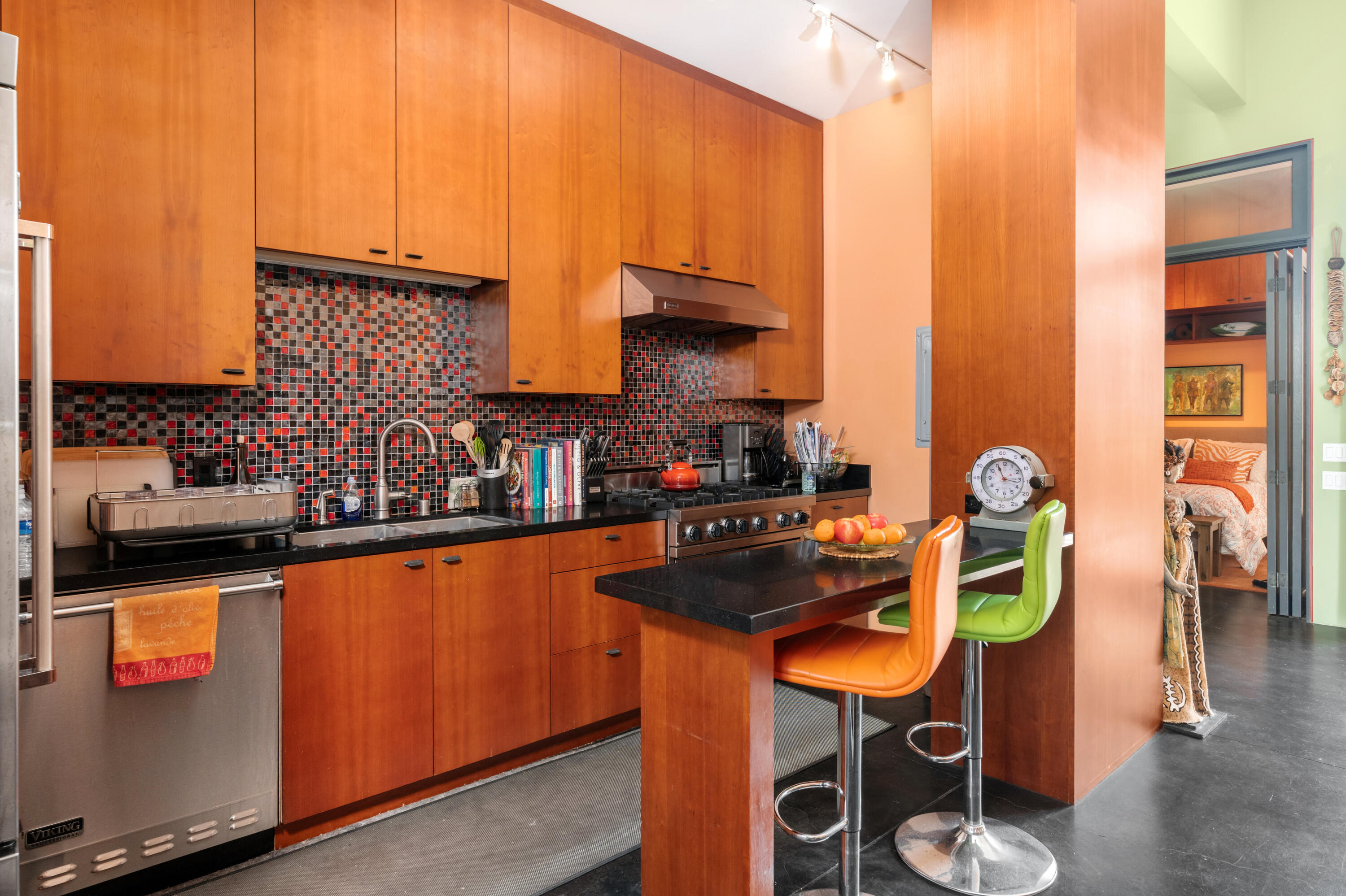 219 Equestrian Avenue Santa Barbara, CA 93101 - Photo 4 of 26 a kitchen with stainless steel appliances granite countertop a sink and cabinets