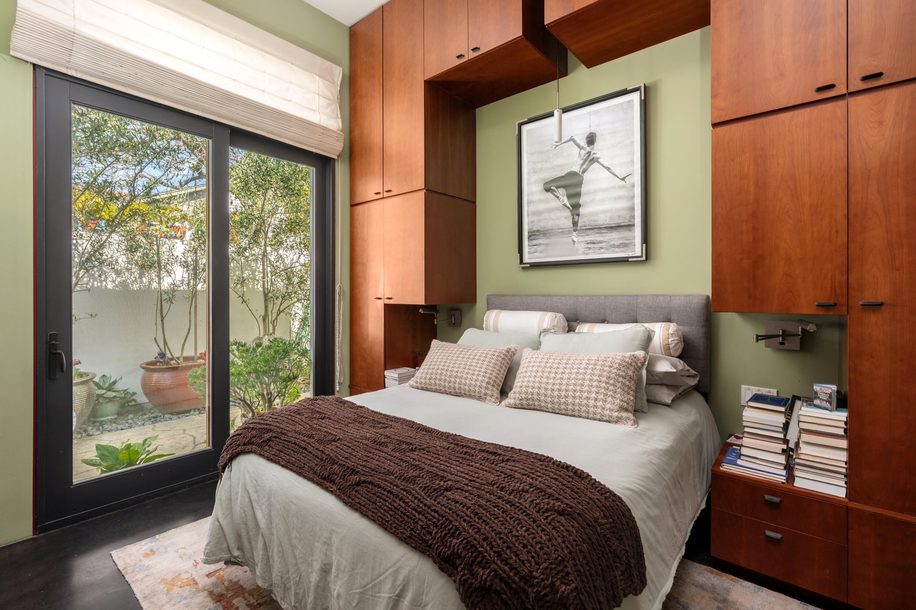 219 Equestrian Avenue Santa Barbara, CA 93101 - Photo 5 of 26 a bedroom with a large bed and a window