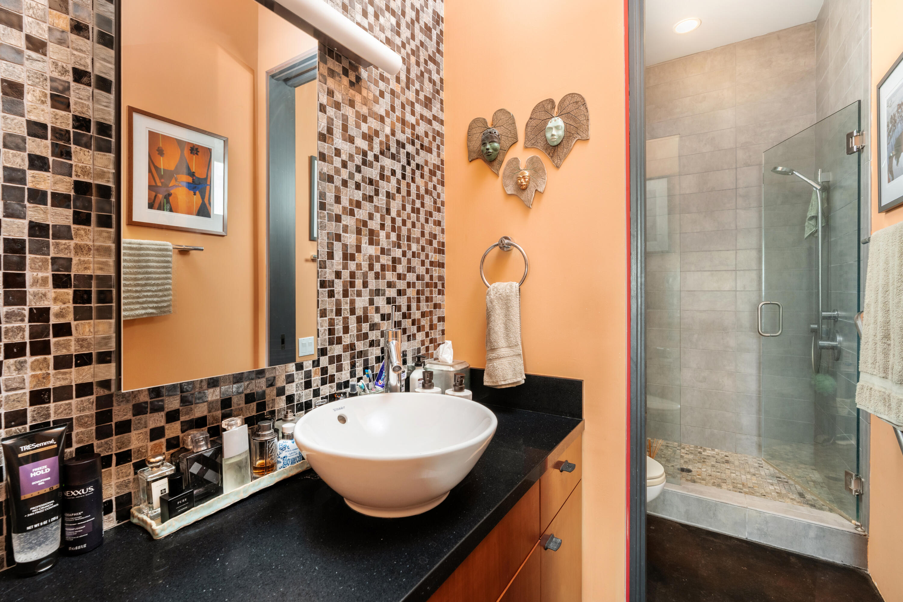 219 Equestrian Avenue Santa Barbara, CA 93101 - Photo 6 of 26 a bathroom with a sink and a mirror